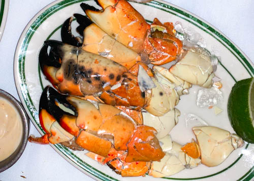 Scotch and the Fox at Joe's Stone Crab in Miami (Plate of crab legs)