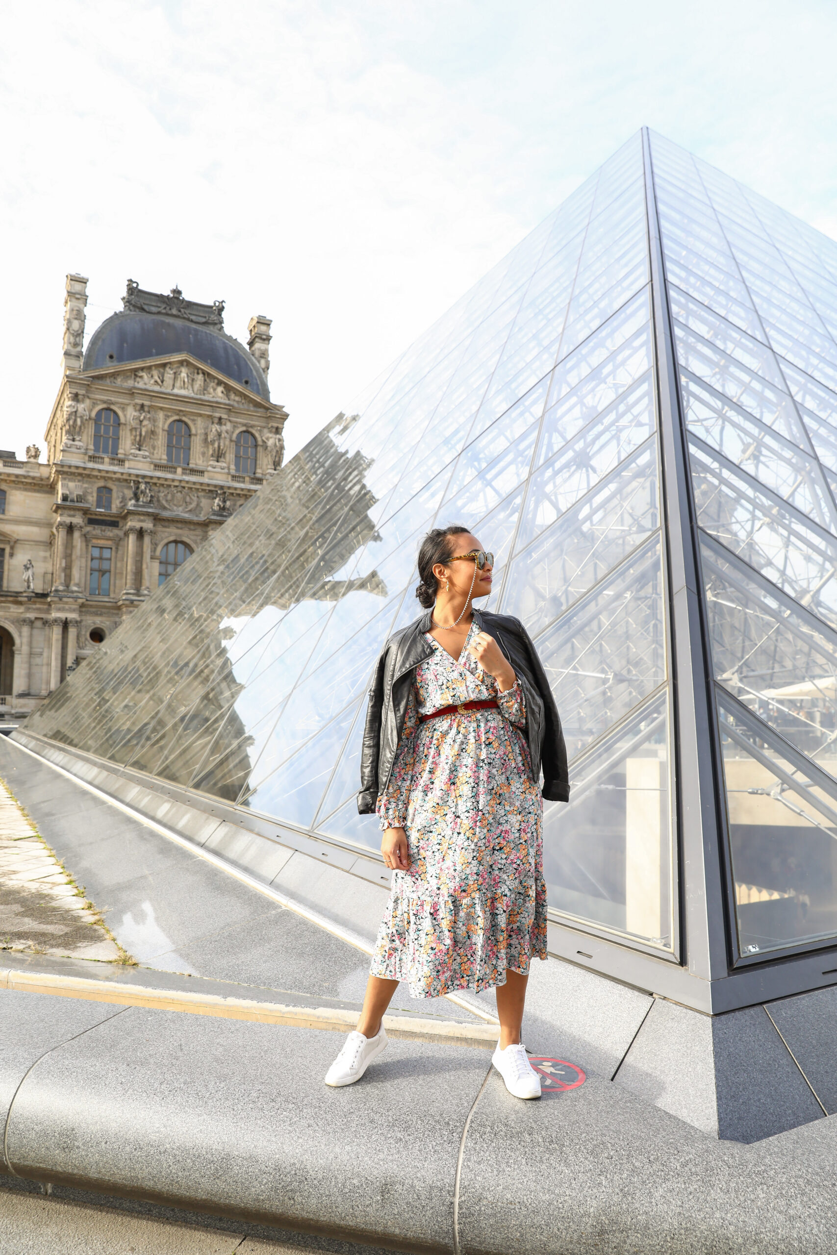 Photo of blogger Scotch and the Fox in front of The Louvre Pyramid in Paris, France